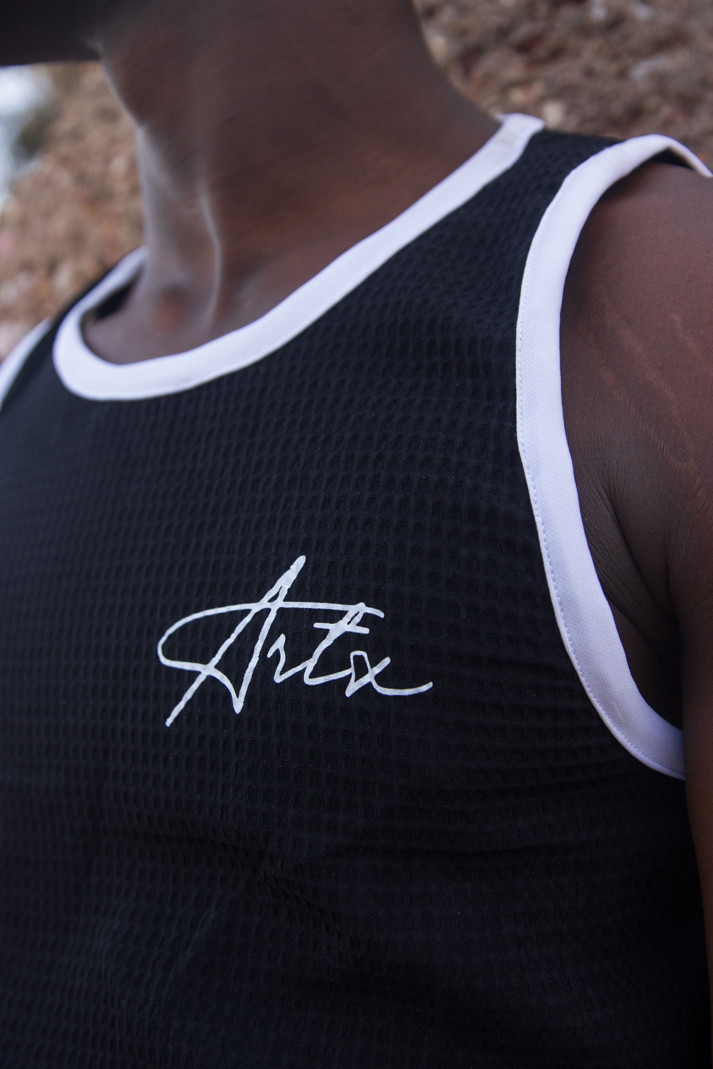 ARETE ESSENTIALS TANK TOP {BLACK}